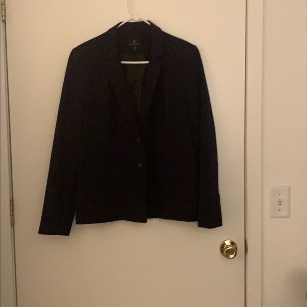 A wonderful navy blue pants suit.